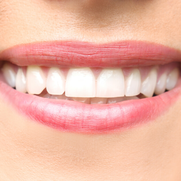 A straight and white smile up close.